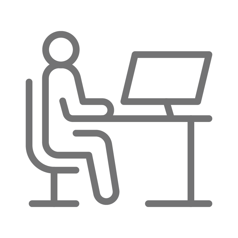Worker sitting at a desk icon for workers comp