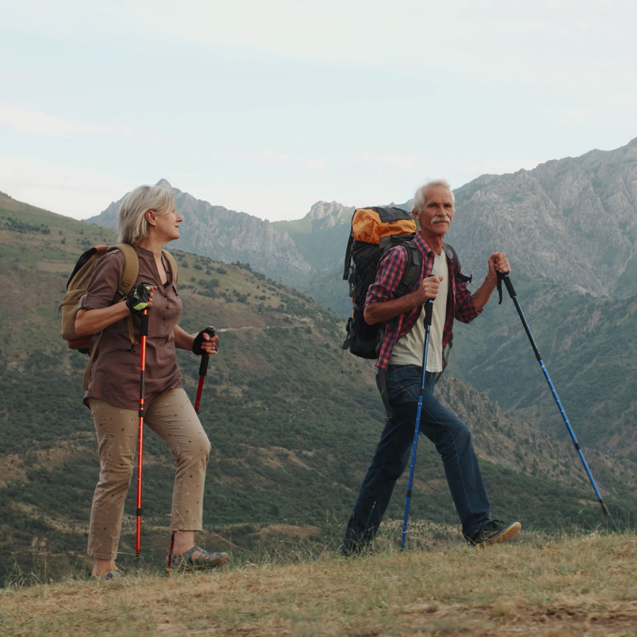Square-AdobeStock_218493726 Senior couple hiking in the wilderness from Adobe Stock images